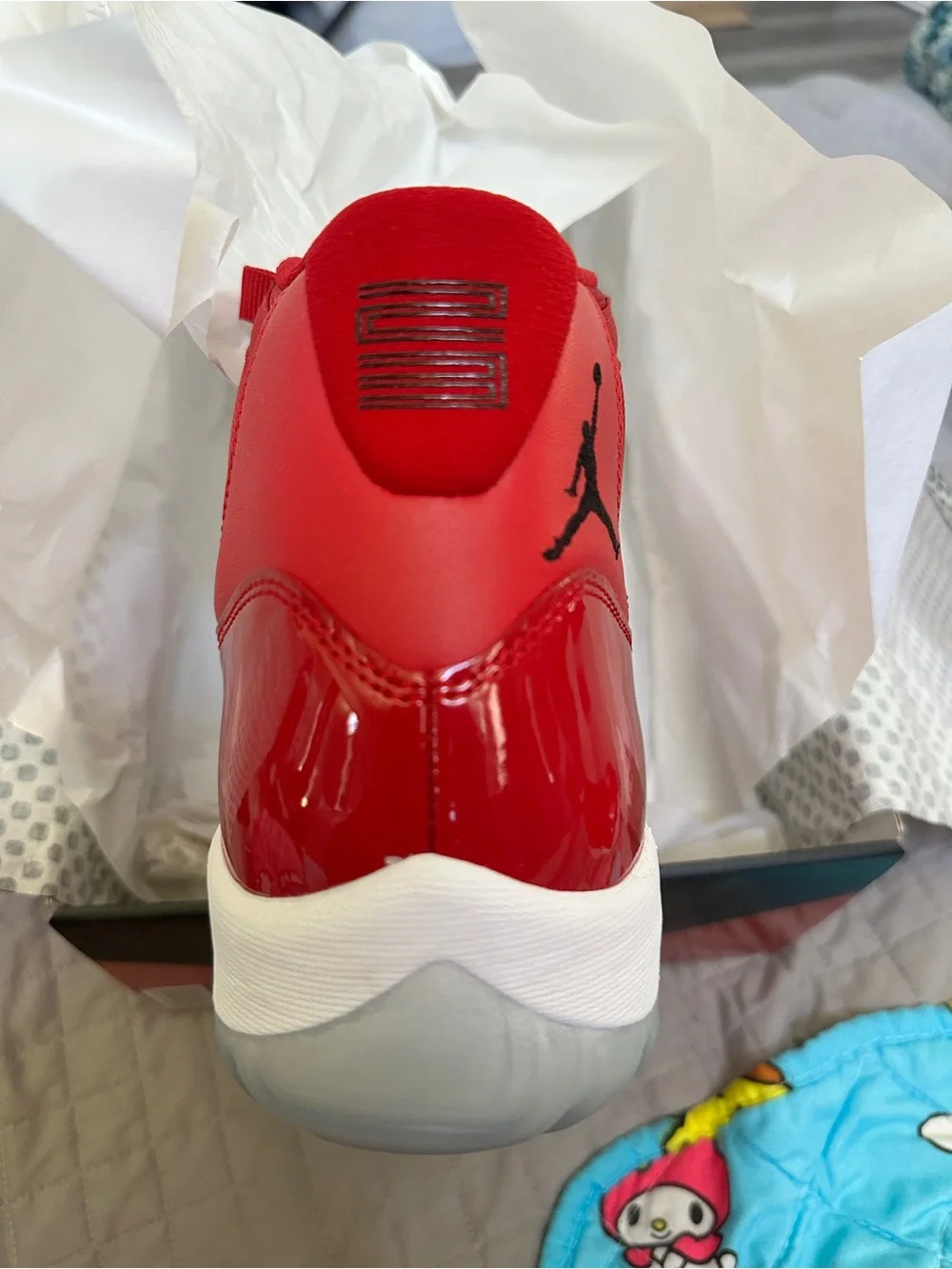 Air Jordan 11 Retro 'Win Like 96' Red Patent Leather Sneakers